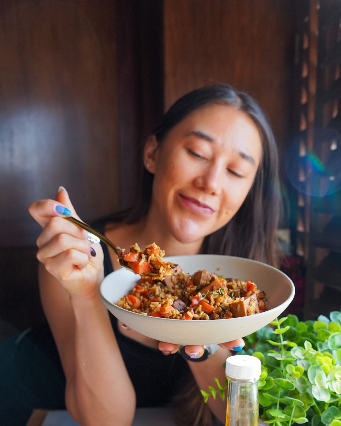 Maria Fernanda Lopez Moreno enjoying a bowl of her one-pot rice